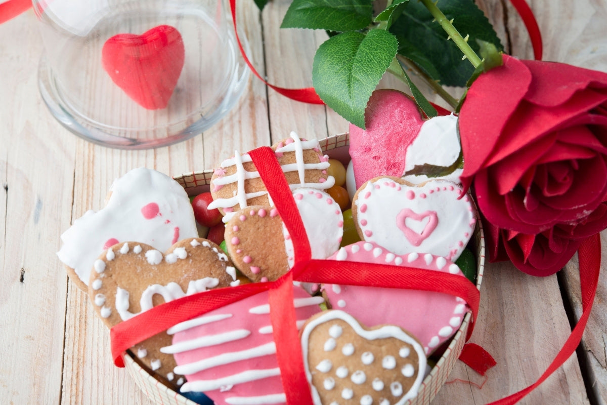 Valentine's Gift Ideas with a Heart Shaped Cookies in Box and Roses