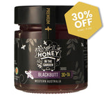 Jar of honey with 'Honey in the Garden' label and 30% off badge on a white background