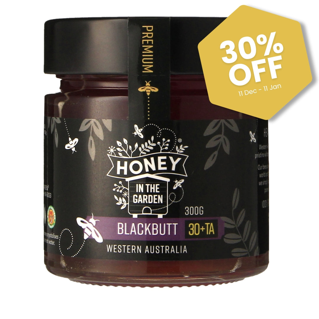 Jar of honey with 'Honey in the Garden' label and 30% off badge on a white background