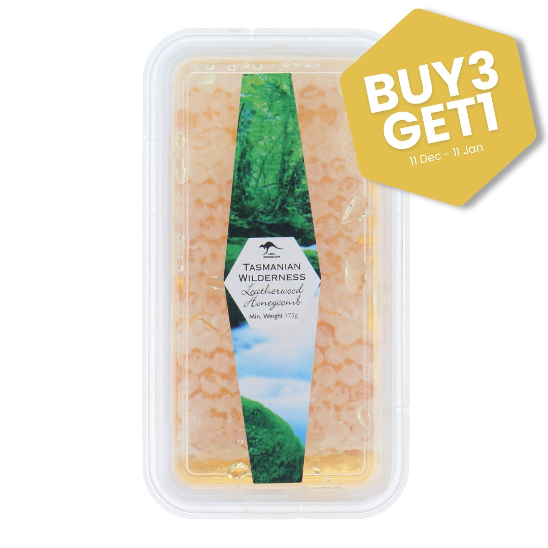 Packaged Tasmanian Wilderness Leatherwood Honeycomb product with promotional text on a white background