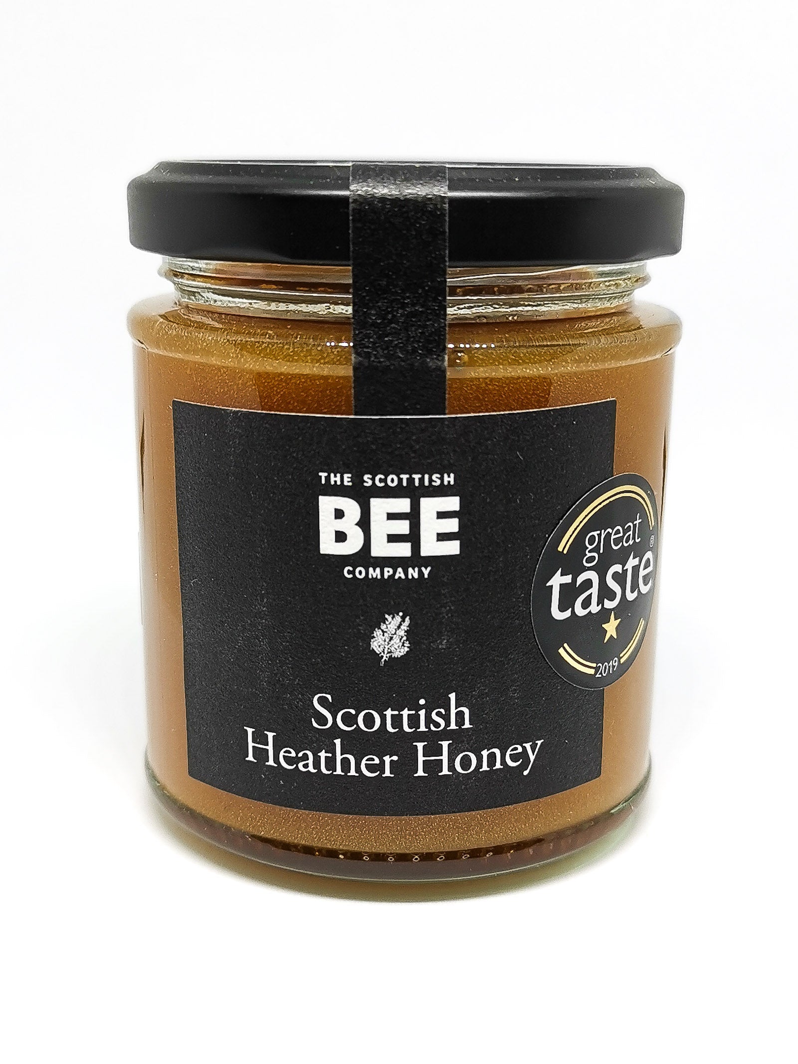 A closed jar of Scottish Heather Honey from The Scottish Bee Company