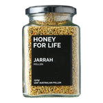 A glass jar containing yellow bee pollen granules with a black label that reads 'HONEY FOR LIFE' and 'JARRAH POLLEN' with text indicating 150g weight and Australian origin.