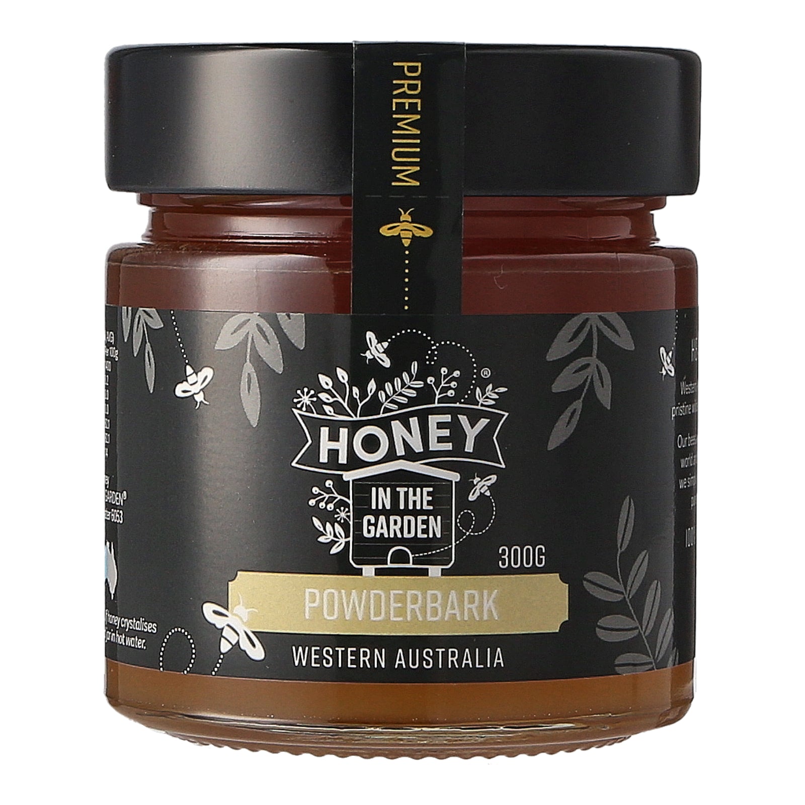 A jar of Powderbark honey labeled 'Honey in the Garden' with a weight indication of 300g, and text stating it is a product from Western Australia.